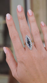 Video of the antique sapphire and diamond ring being worn, capturing the scale, sparkle and distinctive pointed navette shape.