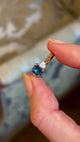 Teal sapphire and diamond three-stone engagement ring