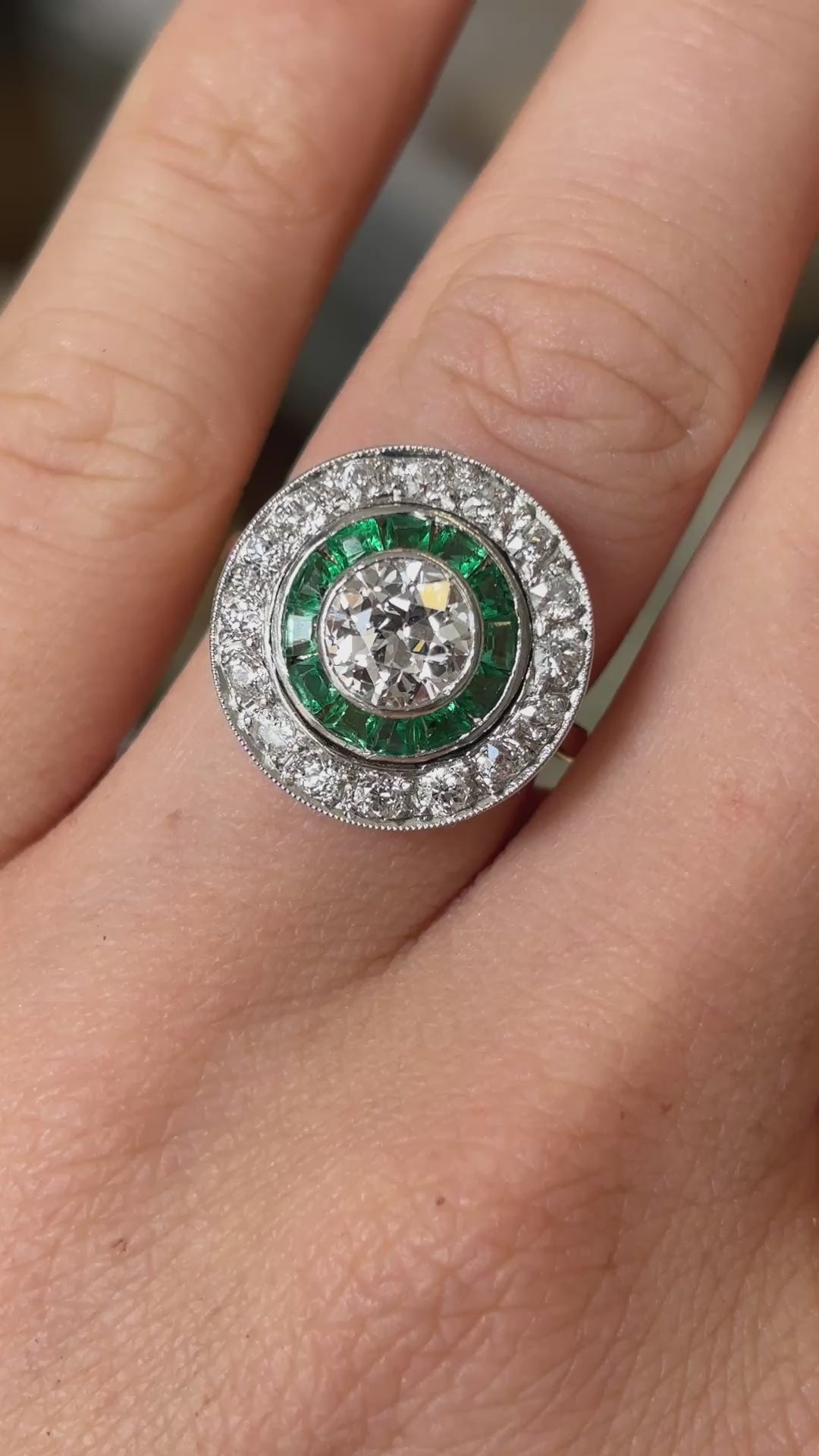 Art Deco emerald & diamond target cluster ring, circa 1920s