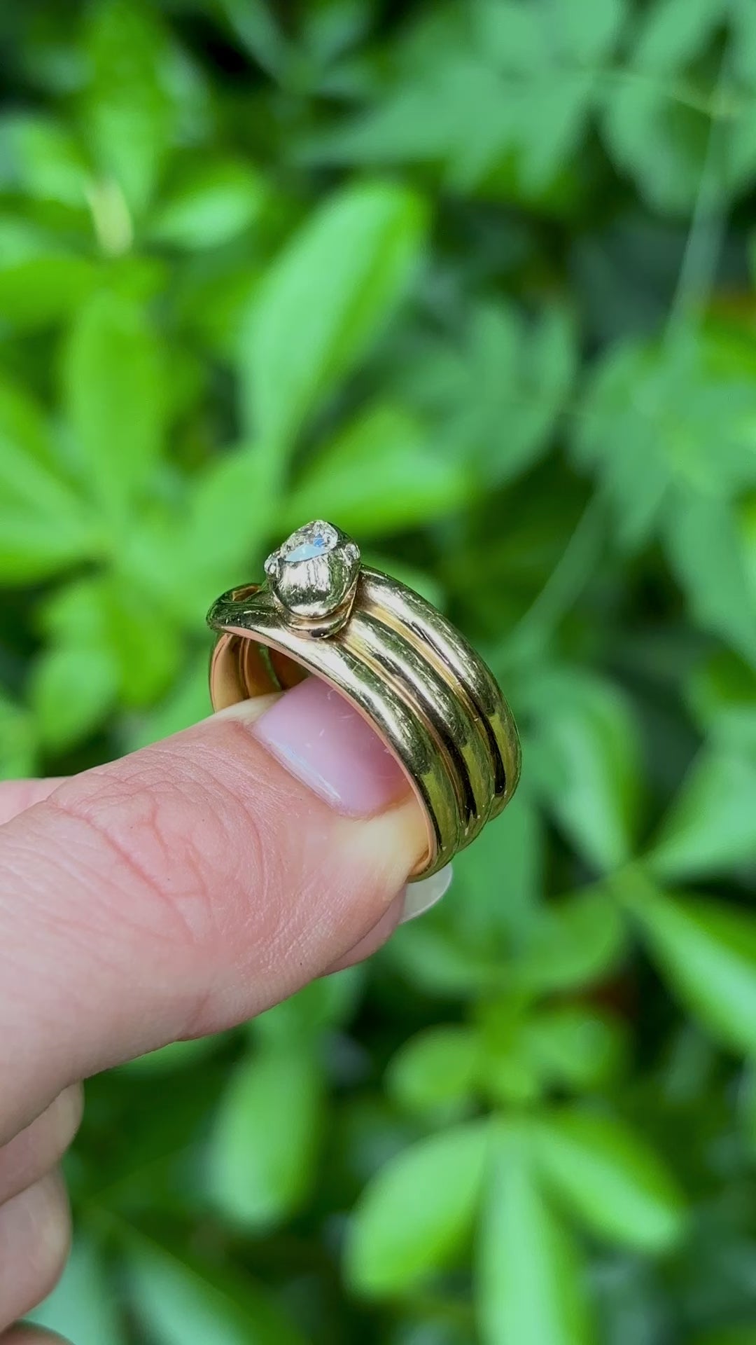 Antique, Victorian diamond set snake ring, 18ct yellow gold held in fingers.