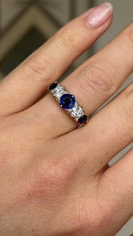 Antique, Victorian sapphire and diamond five-stone ring worn on hand