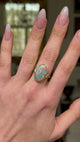 Contemporary, Black Opal and Diamond Cocktail Ring, worn on hand and moved around to give perspective.