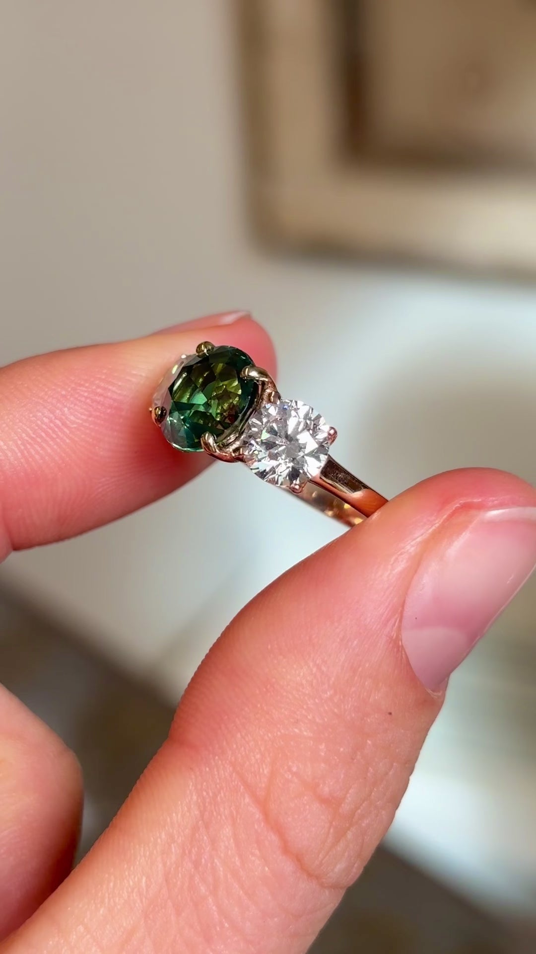 Vintage, teal sapphire and diamond three-stone engagement ring