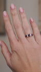 Video showcasing the Victorian ruby and old-cut diamond ring on the hand as the gemstones catch the light.