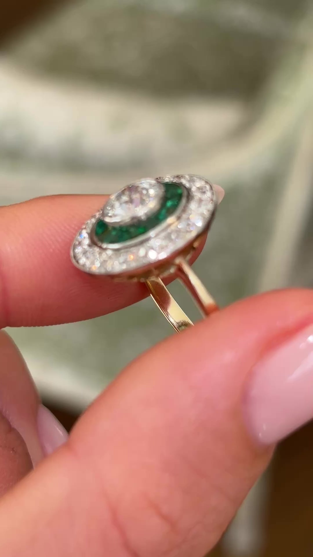 Art Deco emerald & diamond target cluster ring, circa 1920s