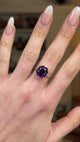 Antique, Edwardian Single stone Amethyst Ring, 18ct Yellow Gold and Platinum worn on hand and rotated to give perspective.