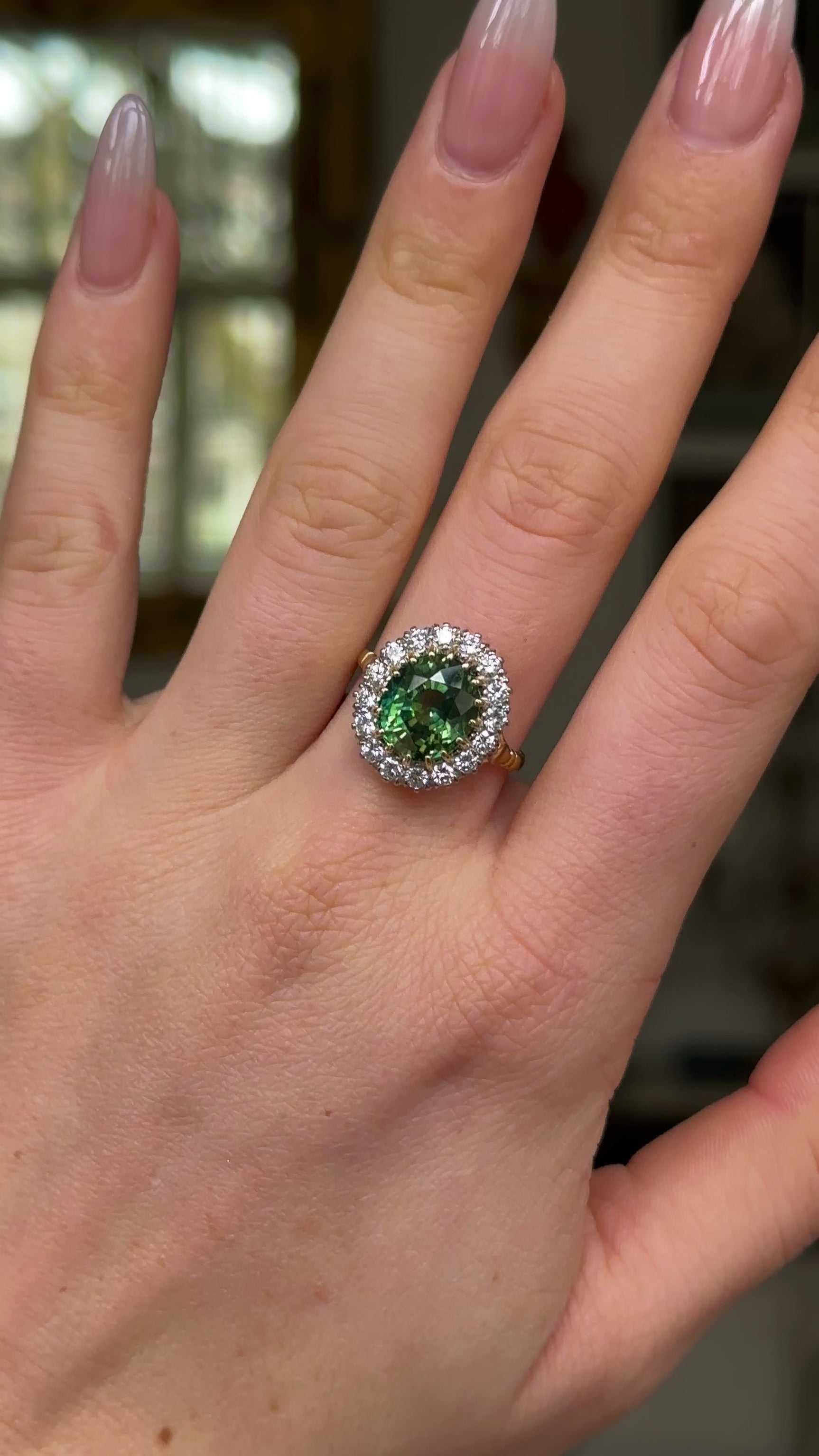 Vintage, 5ct Green Sapphire and Diamond Cluster Ring, 18ct Yellow Gold worn on hand and rotated to give perspective.