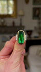 Vintage, Tourmaline and Diamond Cocktail Ring, held in fingers and rotated to give perspective.