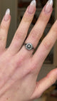 Antique, Edwardian Diamond Cluster Ring, 18ct Yellow Gold worn on hand and rotated to give perspective.