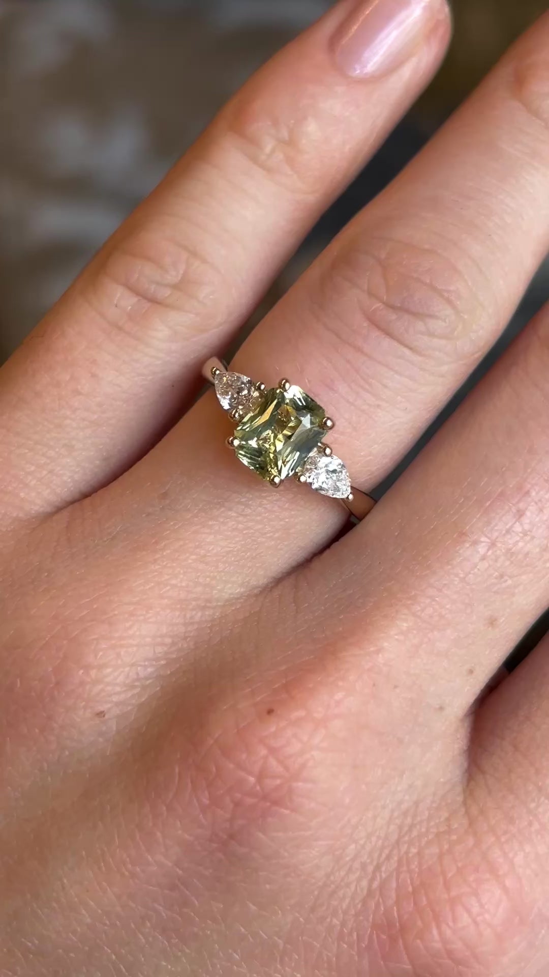 Emerald-cut yellow sapphire and diamond three-stone ring