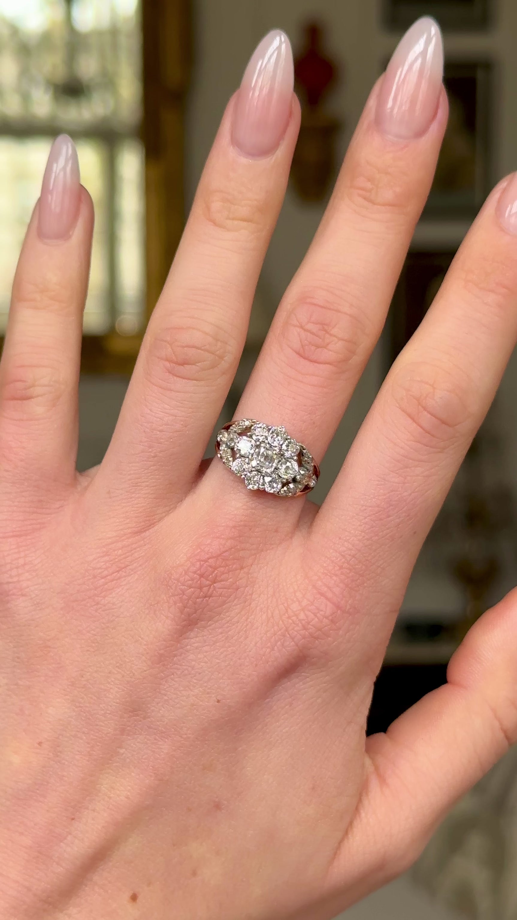 Antique, Georgian Diamond Cluster Ring, worn on hand and rotated to give perspective.