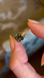 Vintage, 1980's green sapphire solitaire engagement ring