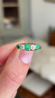 Video showcasing a yellow gold Antique, Victorian emerald & old-mine diamond five-stone ring