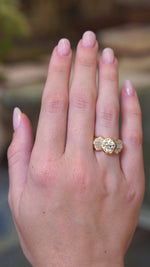 Vintage 1950s old-cut diamond fan engagement ring worn on the hand shown in video.