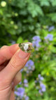 Vintage, 1960s Tiffany & Co Solitaire Diamond Class Ring, 18ct Yellow Gold held in fingers.