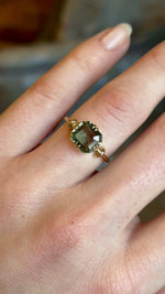 Vintage, 1980's green sapphire solitaire engagement ring