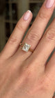 Video of a gold Vintage-inspired,  diamond rub-over solitaire engagement ring worn on a hand.