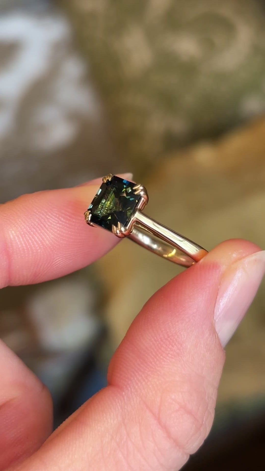 Square step-cut teal sapphire single-stone ring