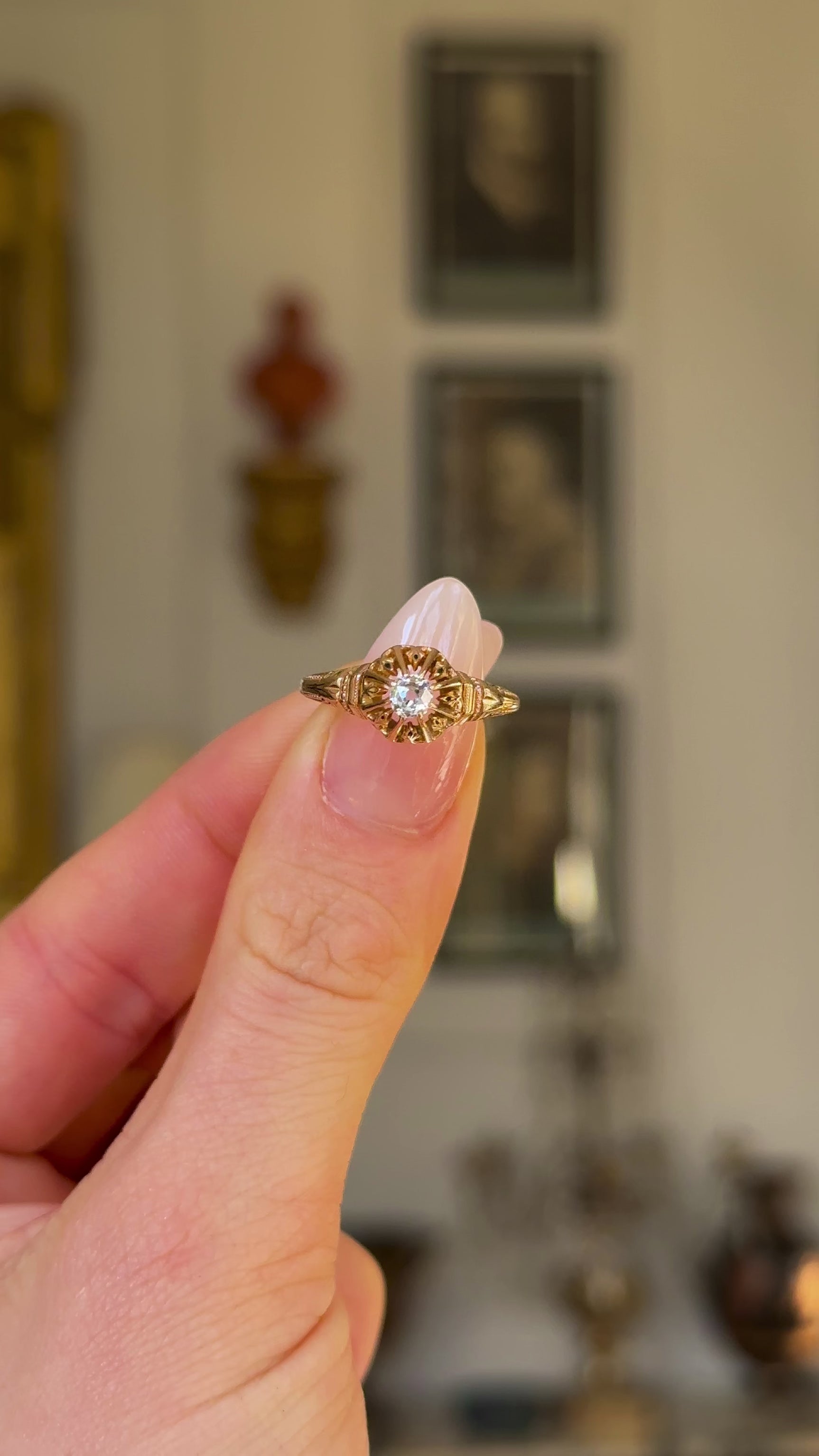 Antique, Victorian, Solitaire Diamond Engagement Ring, 18ct Yellow Gold held in fingers and rotated to give perspective.