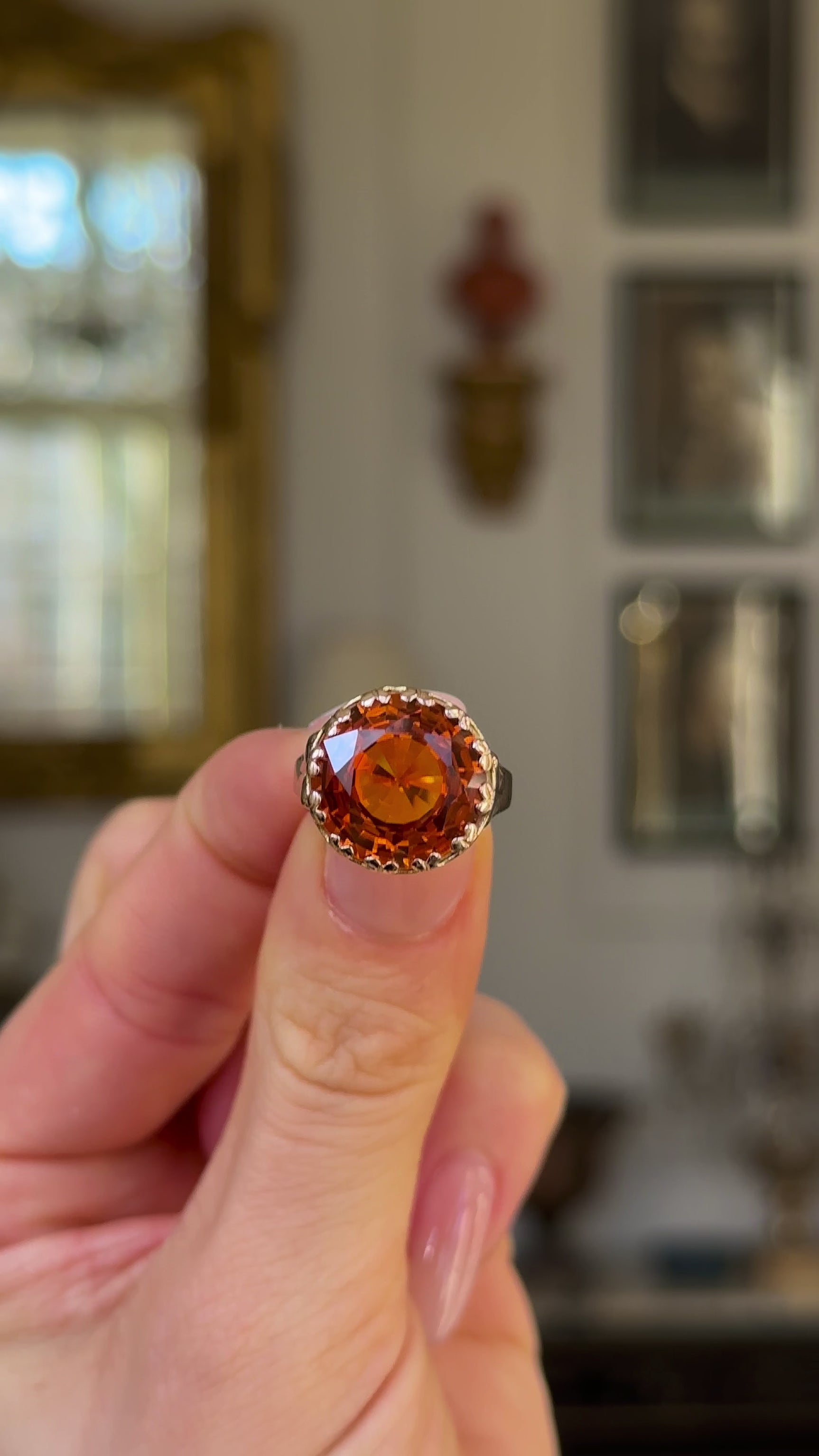 Vintage, 1980s Citrine Cocktail Ring, 18ct Yellow Gold held in fingers and rotated to give perspective.