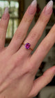 Vintage, 1940s Pink Sapphire Single-Stone Ring, worn on hand and rotated to give perspective.
