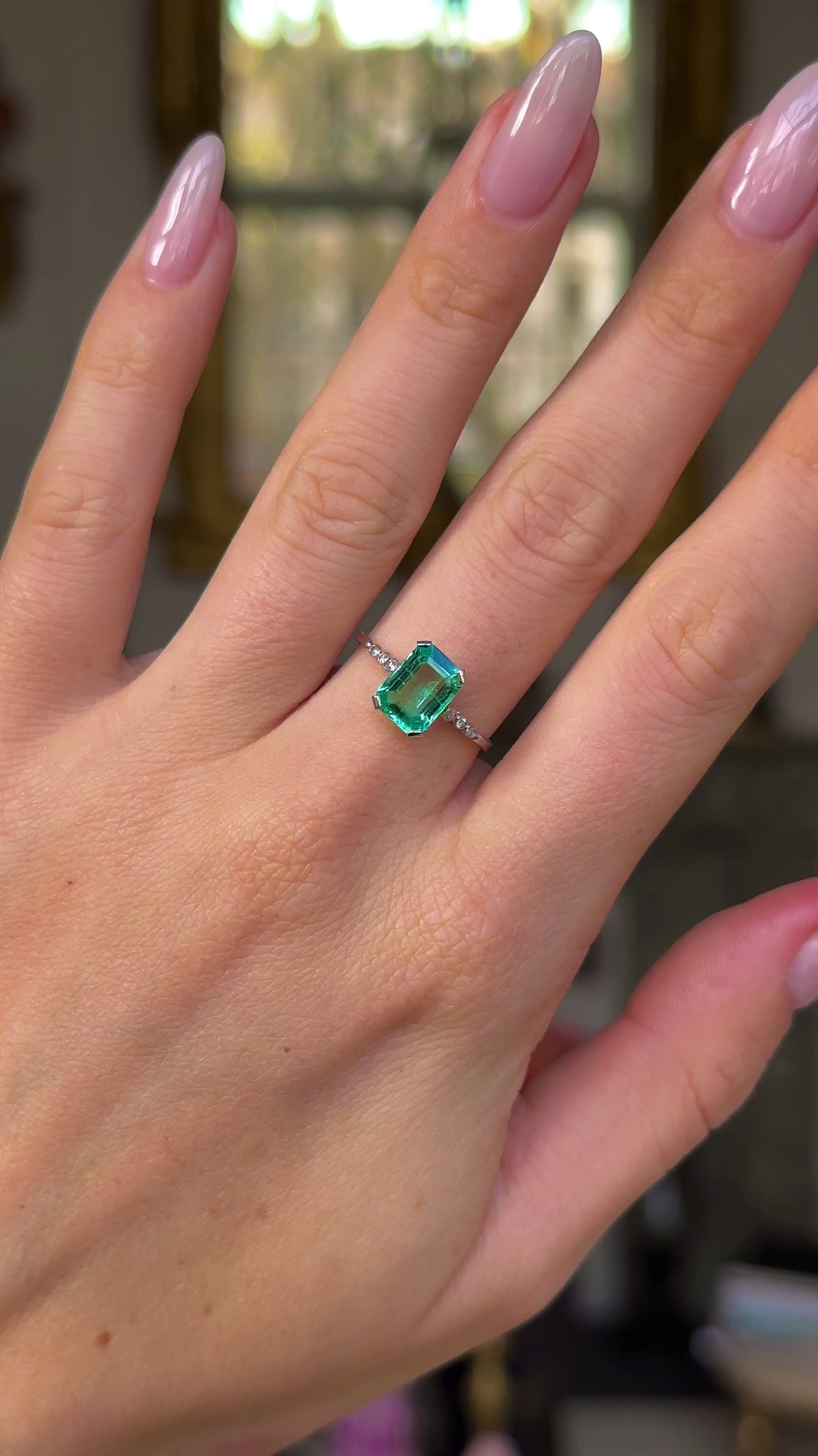Edwardian single stone ring worn on hand and moved around to give perspective.