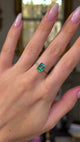 Edwardian single stone ring worn on hand and moved around to give perspective.
