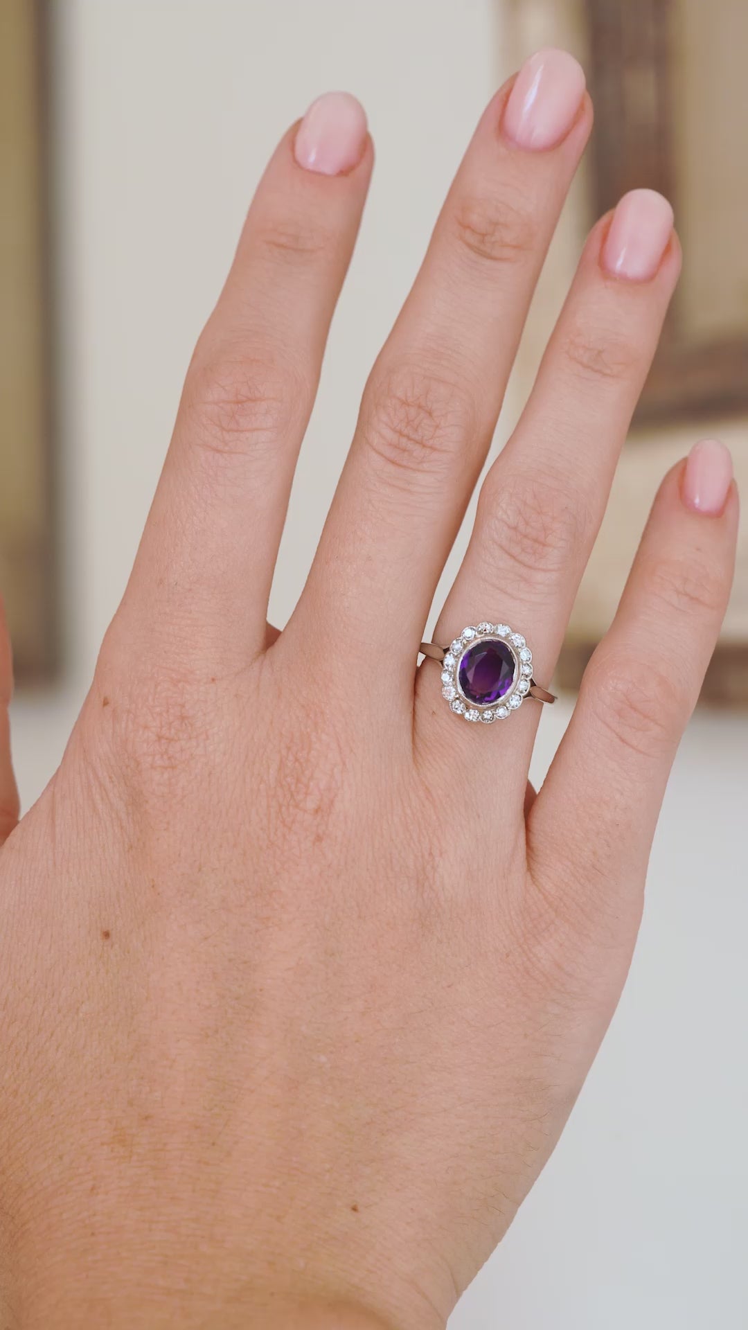 Video of the antique amethyst and diamond ring being worn, showing its colour, presence and refined Edwardian proportions.