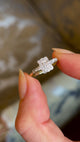 Antique, Edwardian diamond panel cluster engagement ring held in fingers and moved around to show fine details