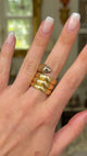 Victorian yellow gold snake ring, worn on hand and rotated to give perspective.