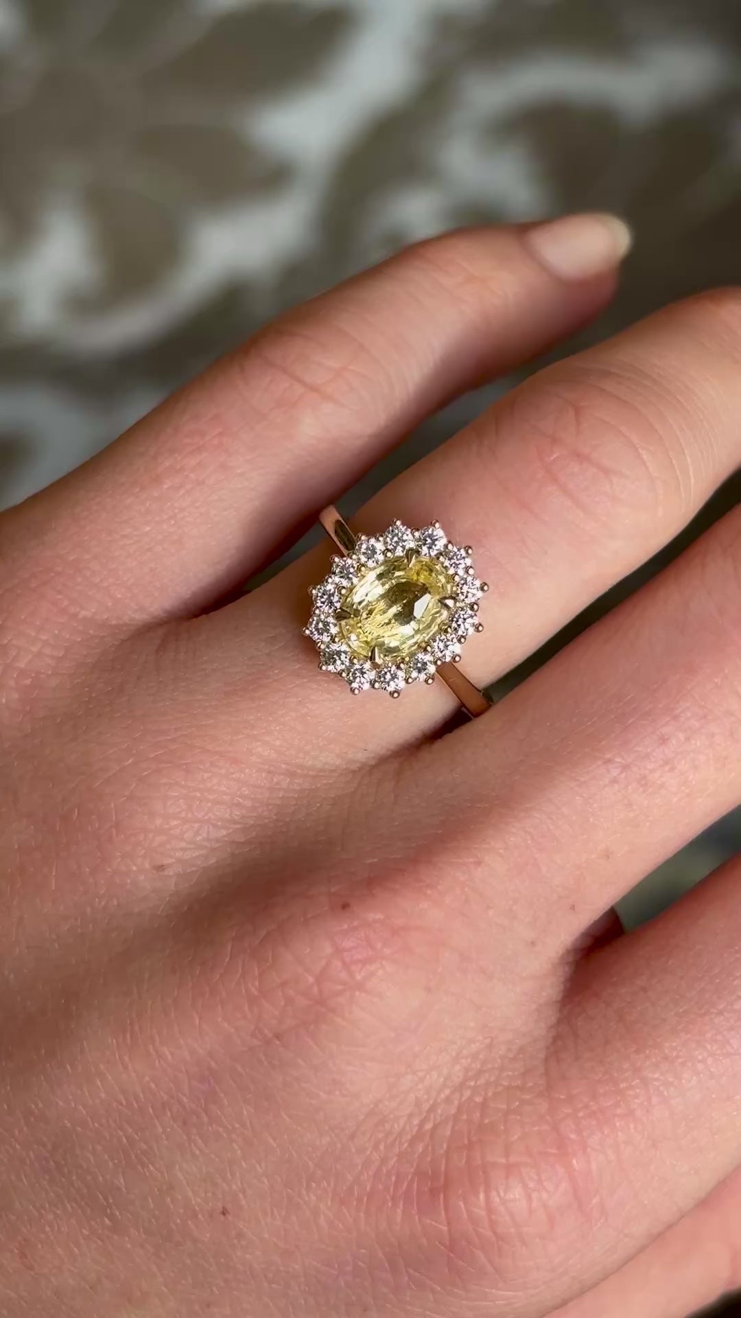 Sri Lankan yellow sapphire and diamond cluster engagement ring