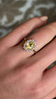 Sri Lankan yellow sapphire and diamond cluster engagement ring