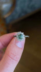 Oval-cut green sapphire & diamond cluster ring