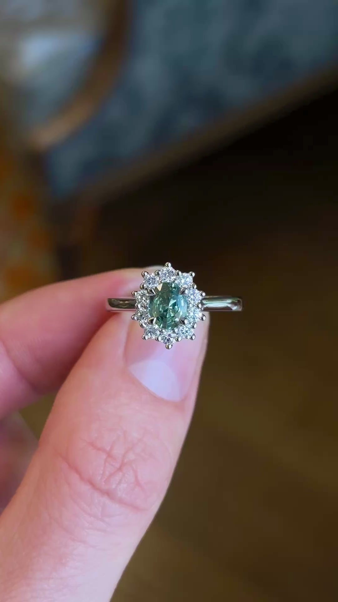 Oval-cut green sapphire & diamond cluster ring