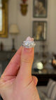 Vintage, Art Deco Diamond Three-Stone Engagement Ring, Platinum held in fingers to give perspective.