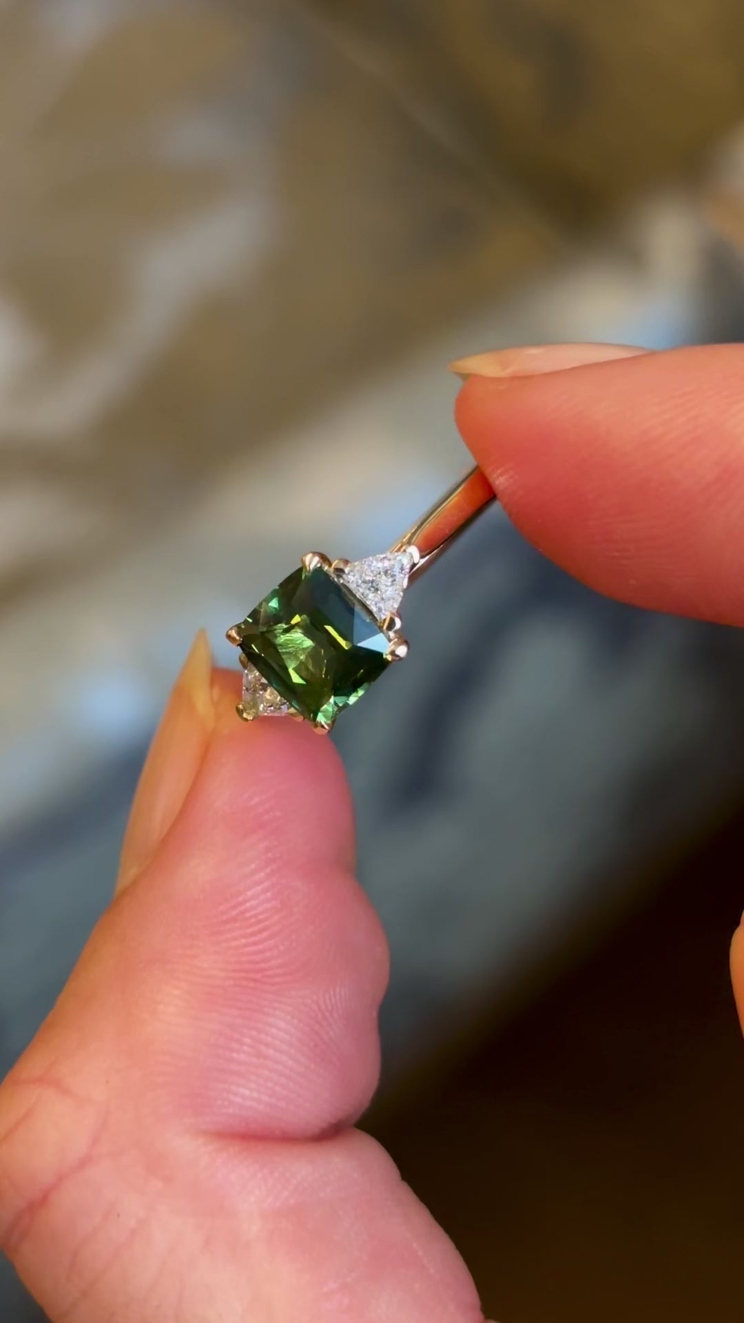 Teal sapphire and diamond three-stone engagement ring