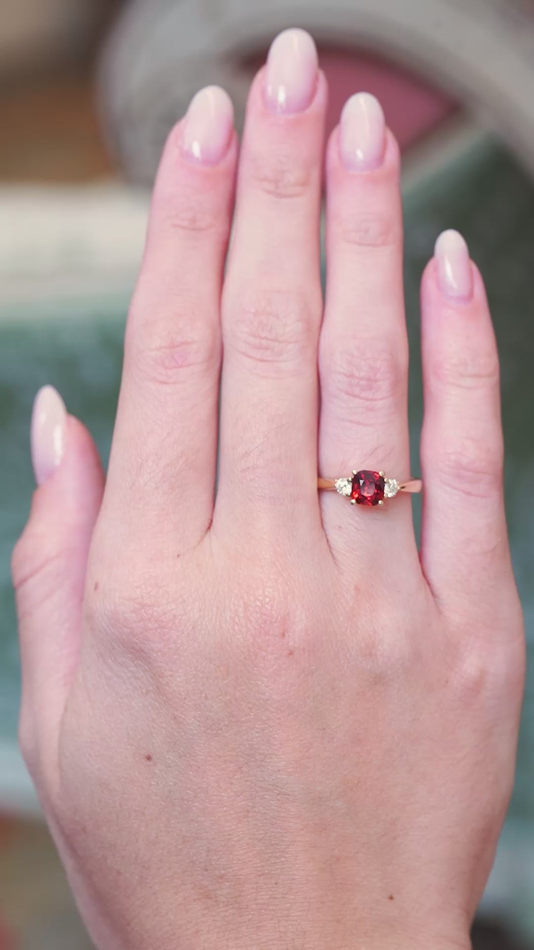 Antique inspired, cherry red spinel & diamond three-stone engagement ring