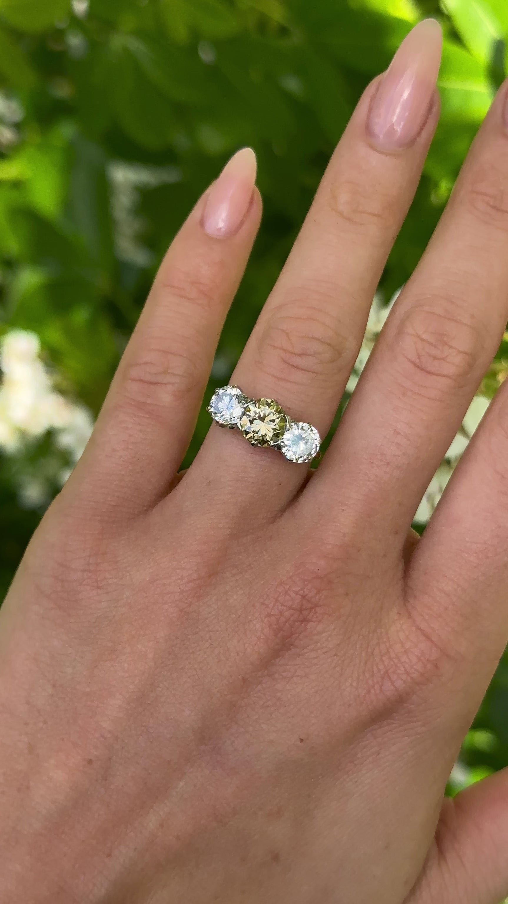 1960s Three-Stone Natural Cinnamon Brown & White Diamond Engagement Ring worn on hand.