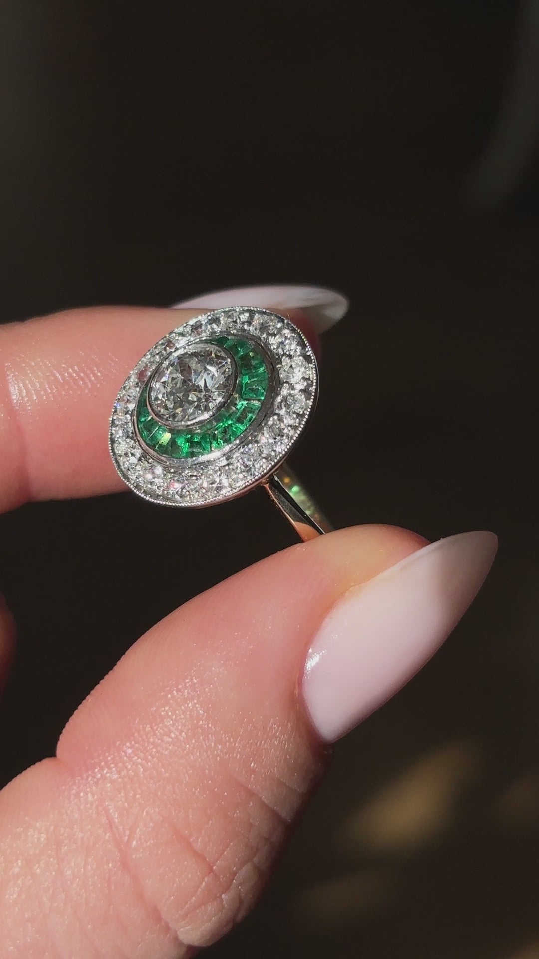 Art Deco emerald & diamond target cluster ring, circa 1920s