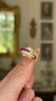 Retro Tiffany & Co. ruby and diamond ring held in fingers and moved around to give perspective.