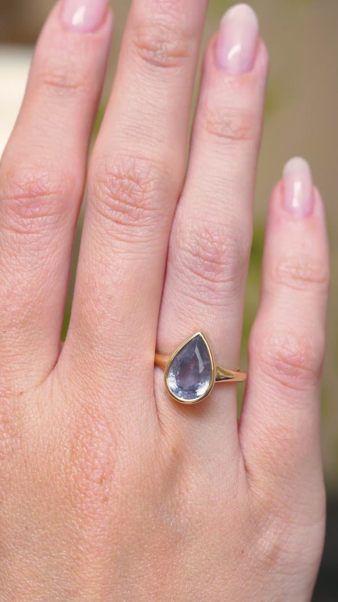 Antique-inspired, blue-grey colour change sapphire solitaire ring