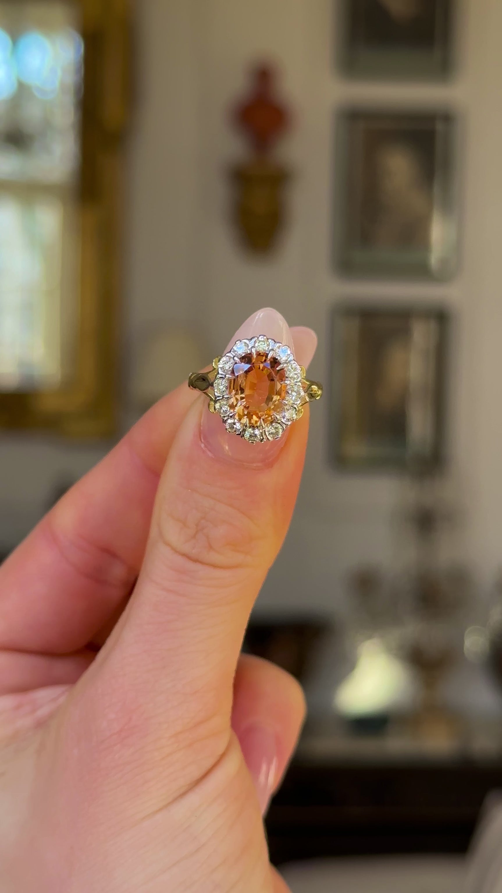 Antique, Victorian Topaz and Diamond Cluster Ring, 18ct Yellow Gold held in fingers and rotated to give perspective.