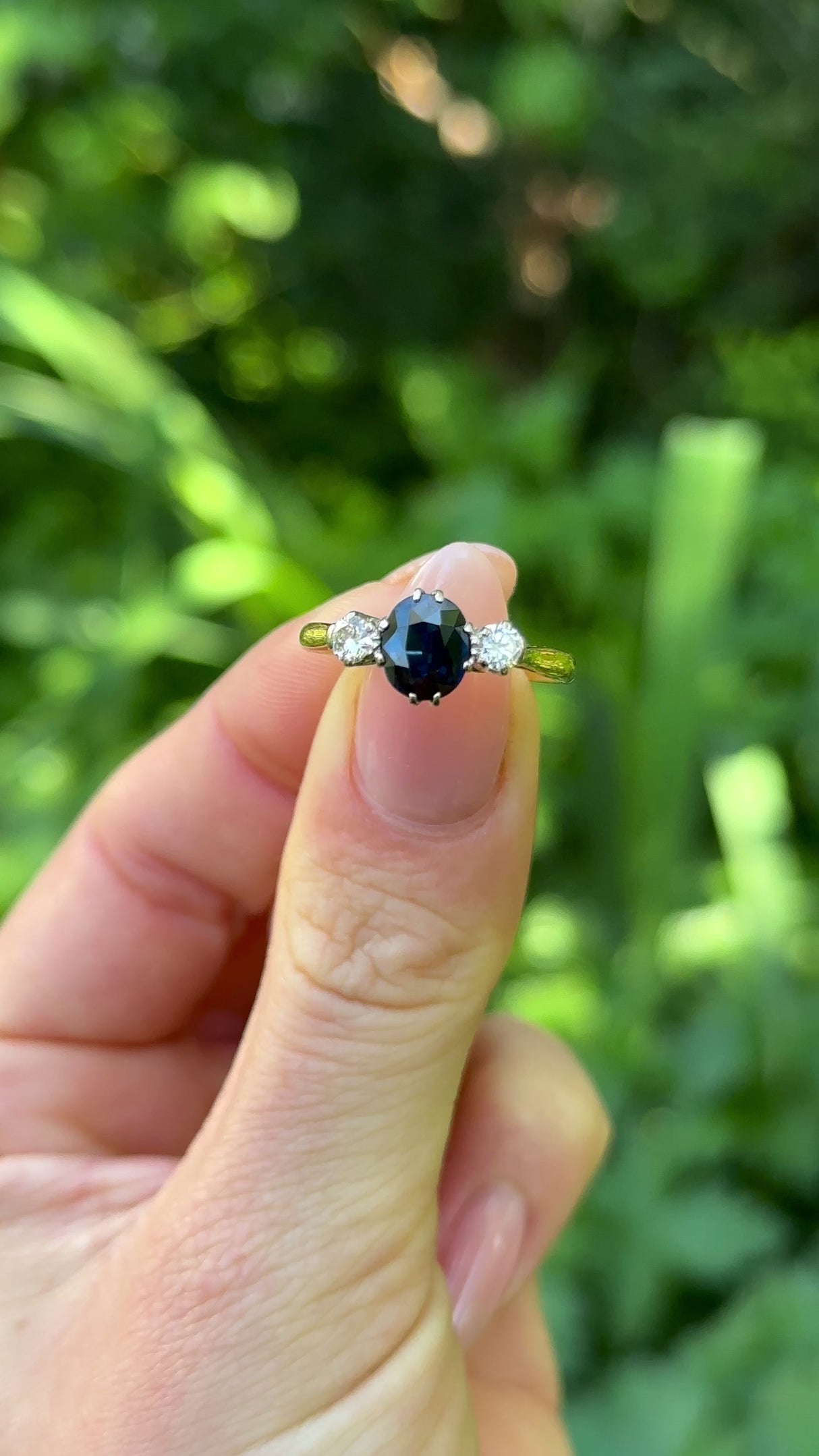 Vintage, Art Deco Sapphire and Diamond Three-Stone Ring, 18ct Yellow Gold and Platinum worn on hand.