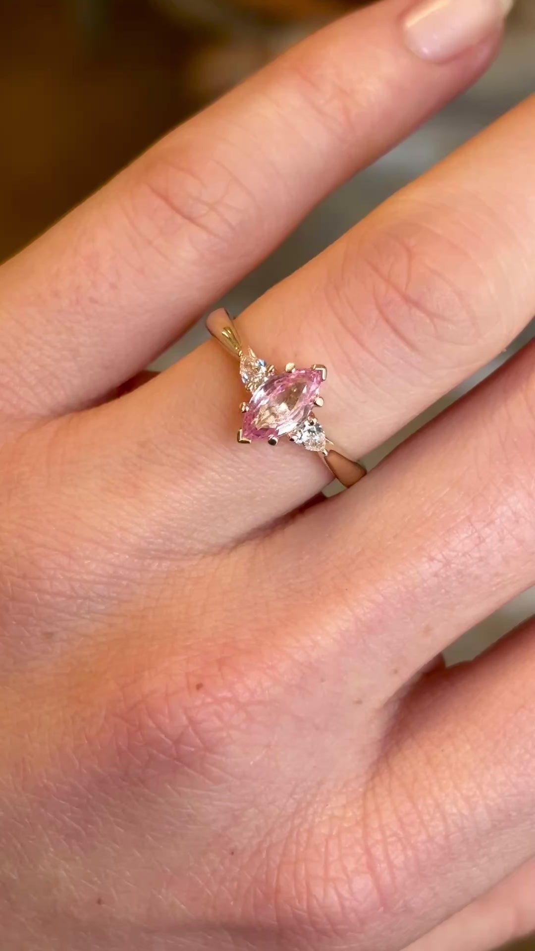 Marquise-cut Padparascha Pink sapphire and diamond three-stone engagement ring