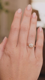 video of Antique-inspired, Light brown diamond solitaire engagement ring worn on the hand 