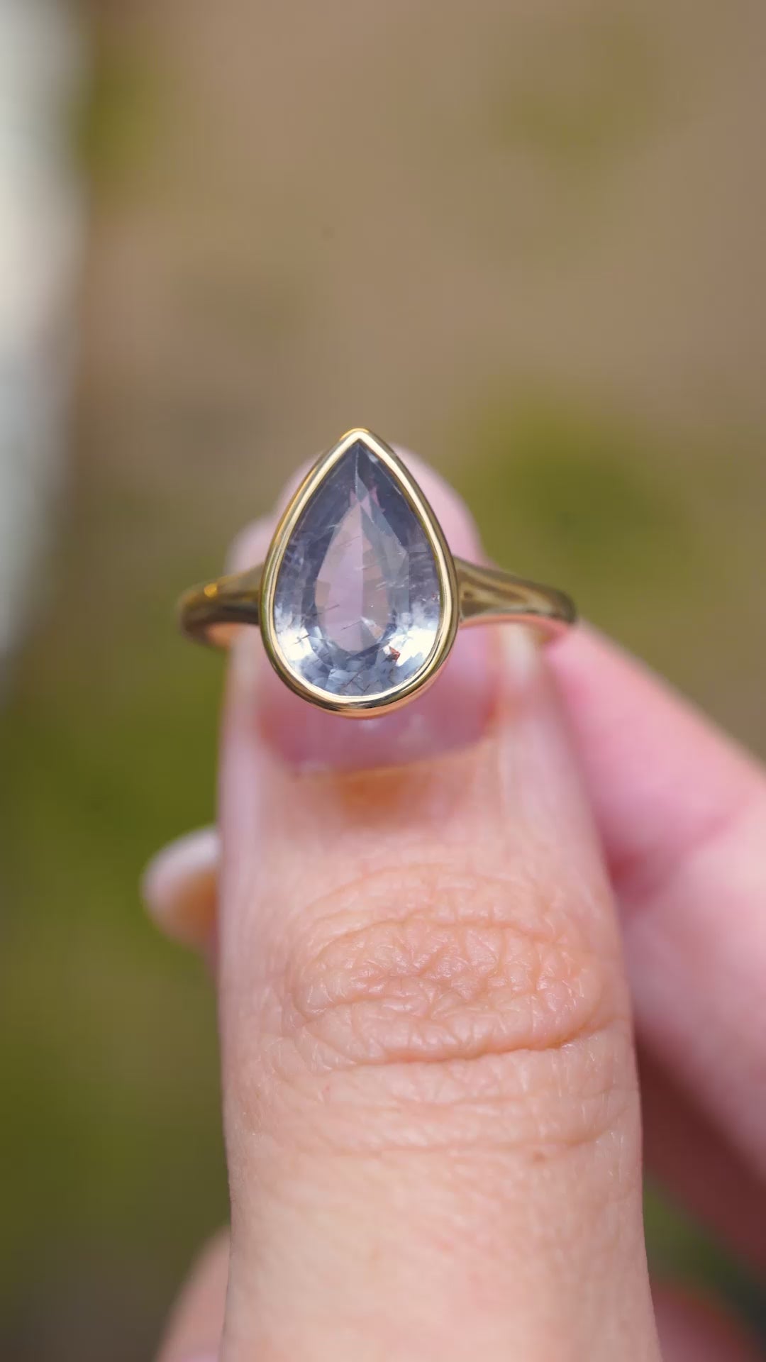 Antique-inspired, blue-grey colour change sapphire solitaire ring