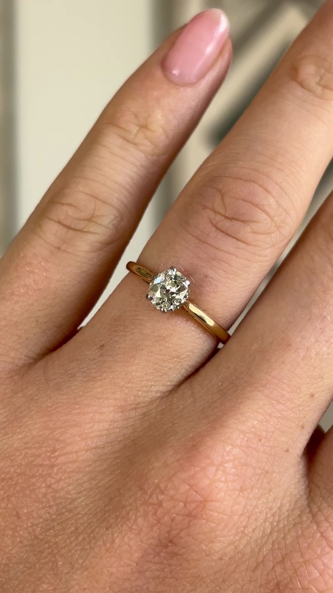 Vintage, old cushion-oval cut solitaire diamond ring
