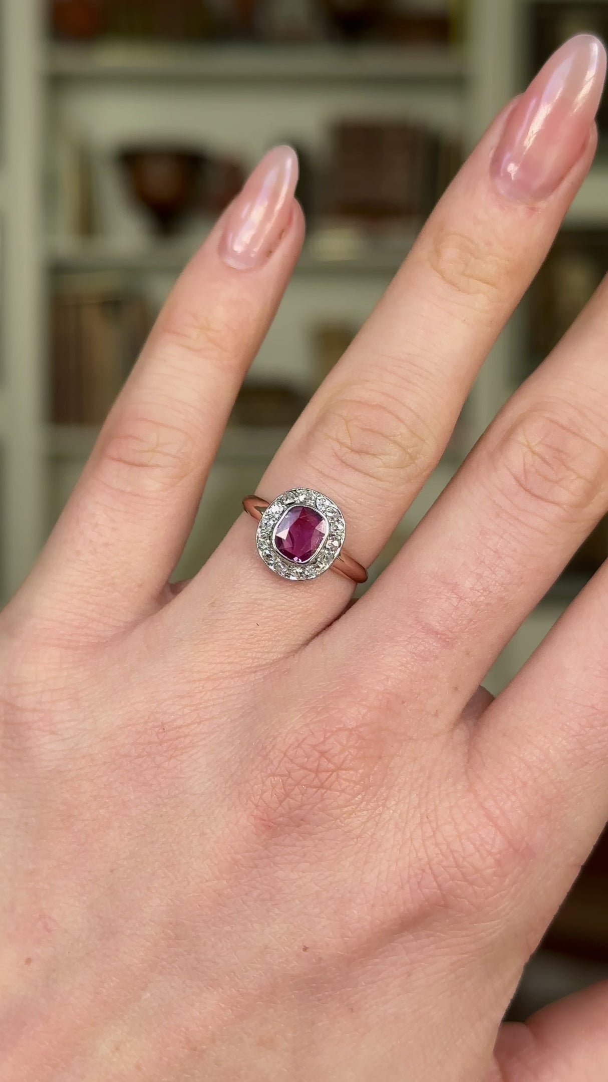 Antique, Edwardian Pink Sapphire and Diamond Cluster Ring, 18ct Yellow Gold and Platinum worn on hand and rotated to give perspective.