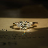 Round 1.07ct diamond and side diamonds three stone engagement ring in yellow gold band