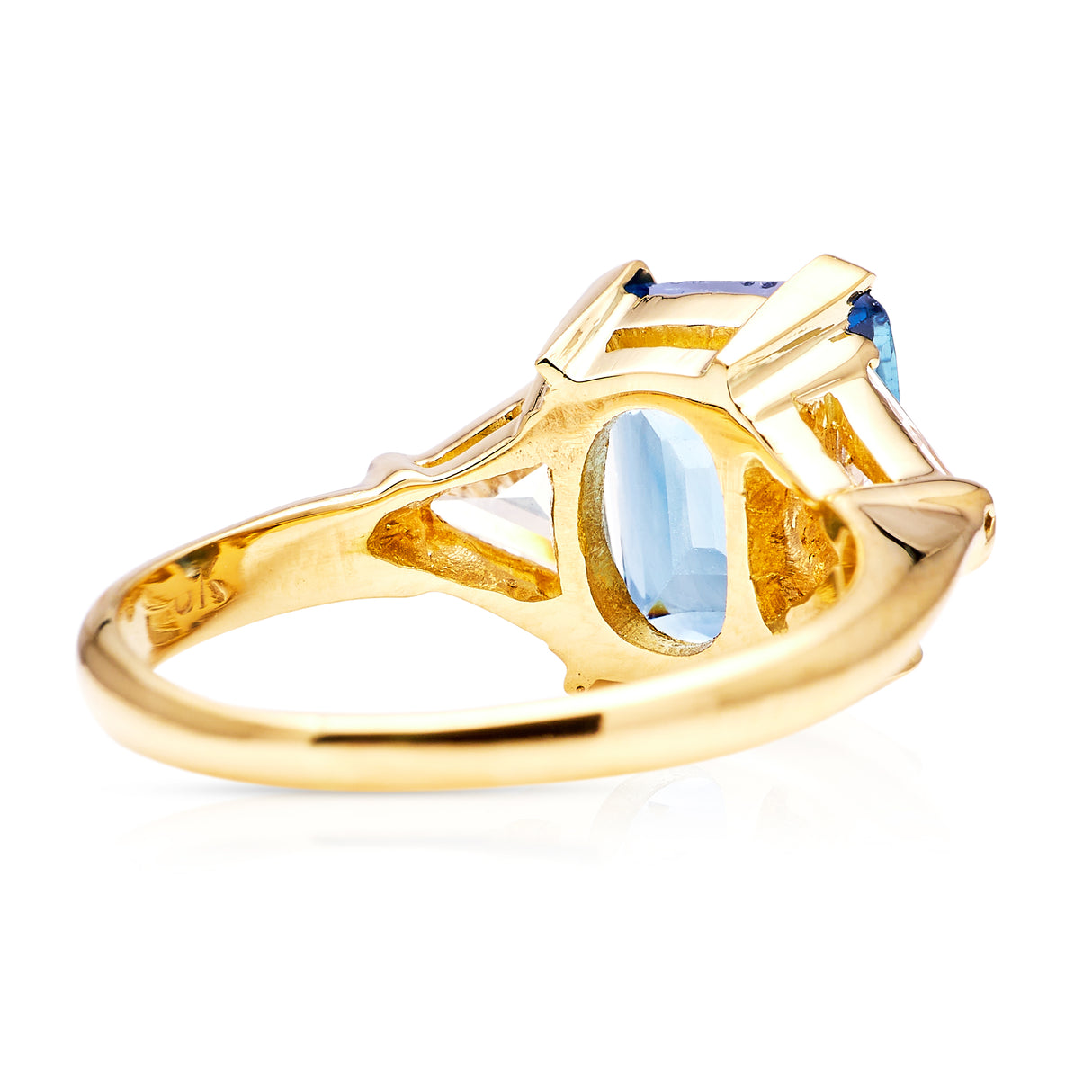 Vintage, blue sapphire and trilliant-cut diamond three stone ring, 18ct yellow gold